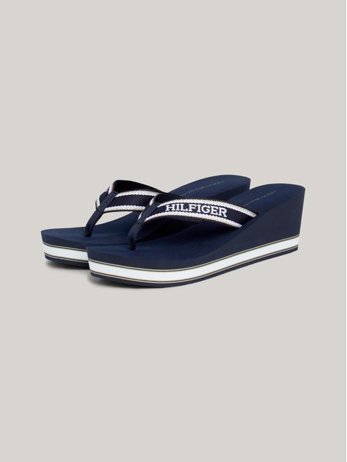 ZAPATILLAS DE CUÑA CON LOGO EN LA TIRA