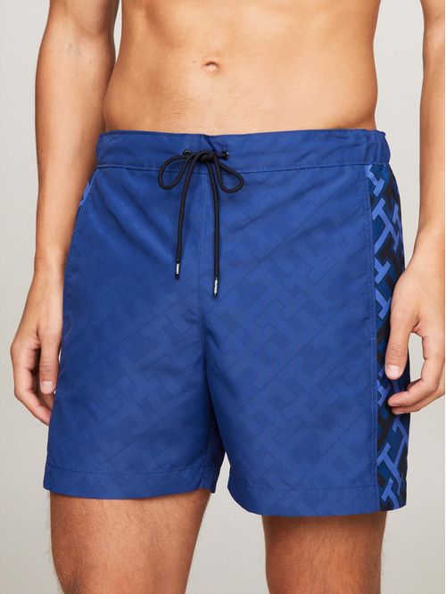 PANTALONETA DE BAÑO DE MEDIO LARGO CON MONOGRAMAS TH
