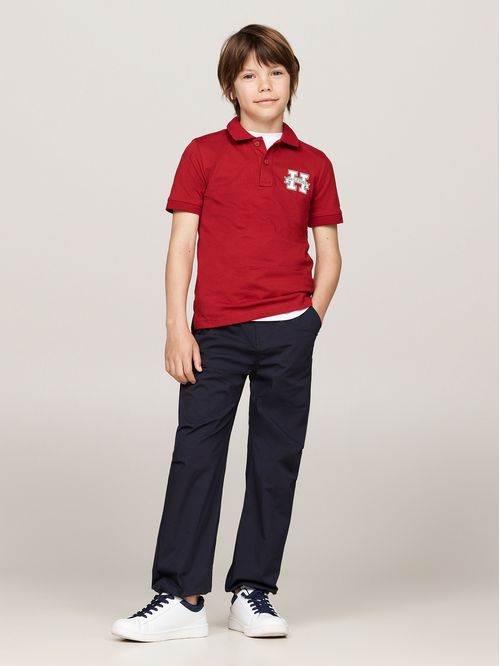 POLO DE CORTE REGULAR CON INICIAL (NIÑOS)