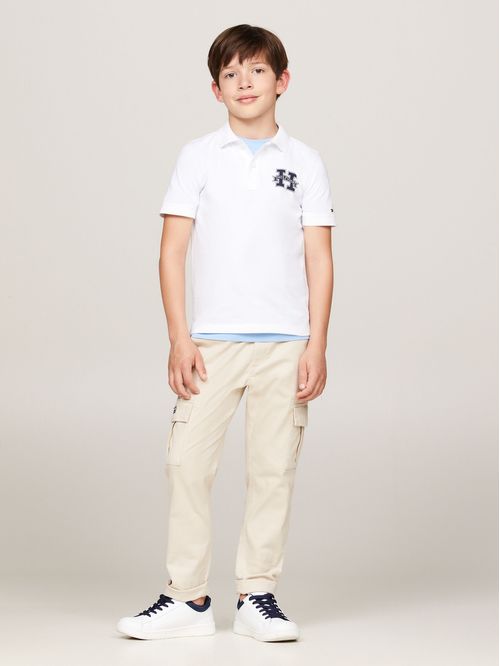POLO DE CORTE REGULAR CON INICIAL (NIÑOS)