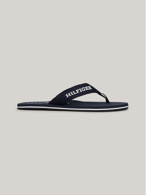 ZAPATILLAS DE TIRAS TRENZADAS CON LOGO