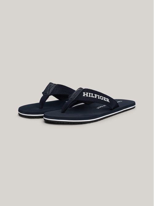 ZAPATILLAS DE TIRAS TRENZADAS CON LOGO