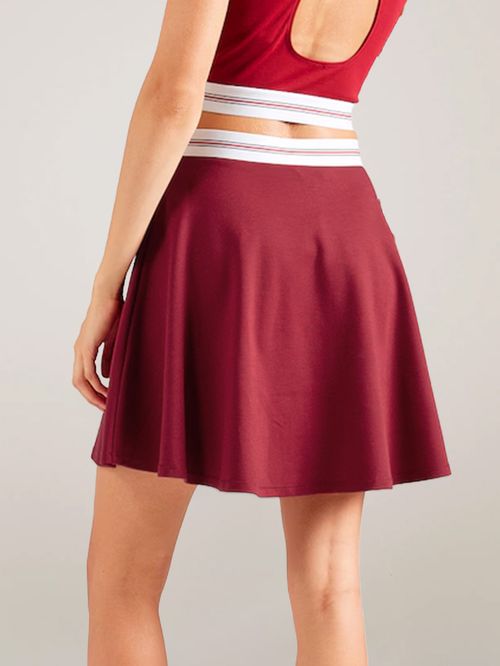 FALDA CON LOGO EN LA CINTURA