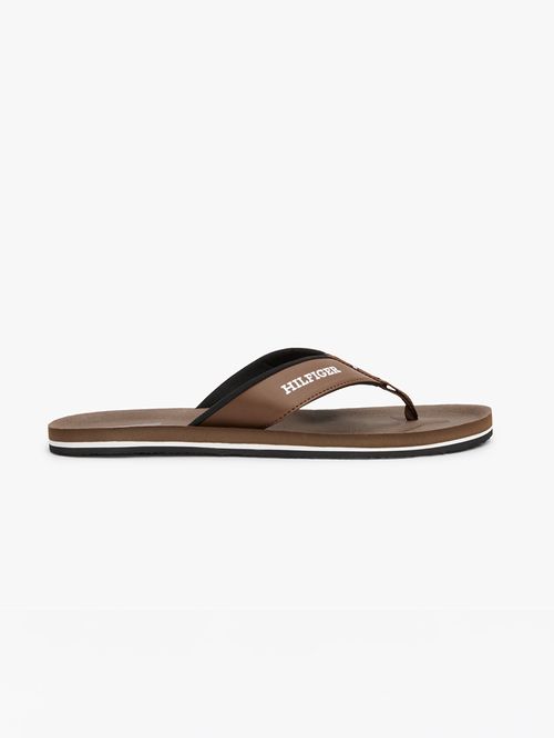 ZAPATILLAS CON TIRAS ACOLCHADAS E INSCRIPCIÓN