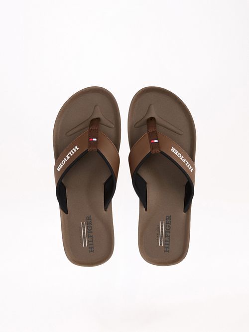 ZAPATILLAS CON TIRAS ACOLCHADAS E INSCRIPCIÓN