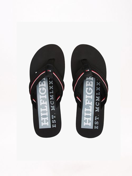 ZAPATILLAS CON CINTA DISTINTIVA