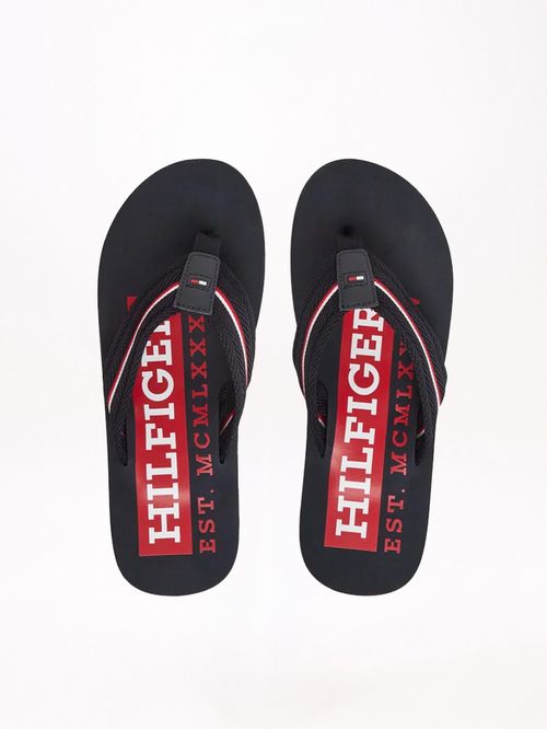 ZAPATILLAS CON CINTA DISTINTIVA