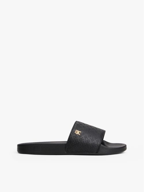 ZAPATILLAS CON MONOGRAMAS TH EN RELIEVE