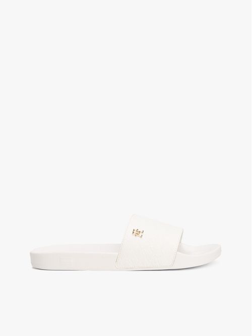 ZAPATILLAS CON MONOGRAMAS TH EN RELIEVE