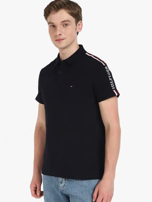POLO DE CORTE REGULAR CON DISEÑO GLOBAL STRIPE EN LA MANGA