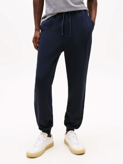 PANTALÓN JOGGERS GLOBAL STRIPE CON BAJO ELÁSTICO
