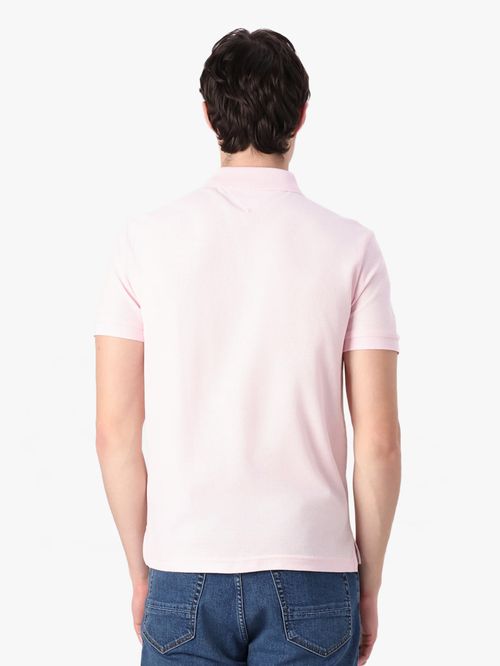 POLO CON LOGO DE MONOGRAMA TH